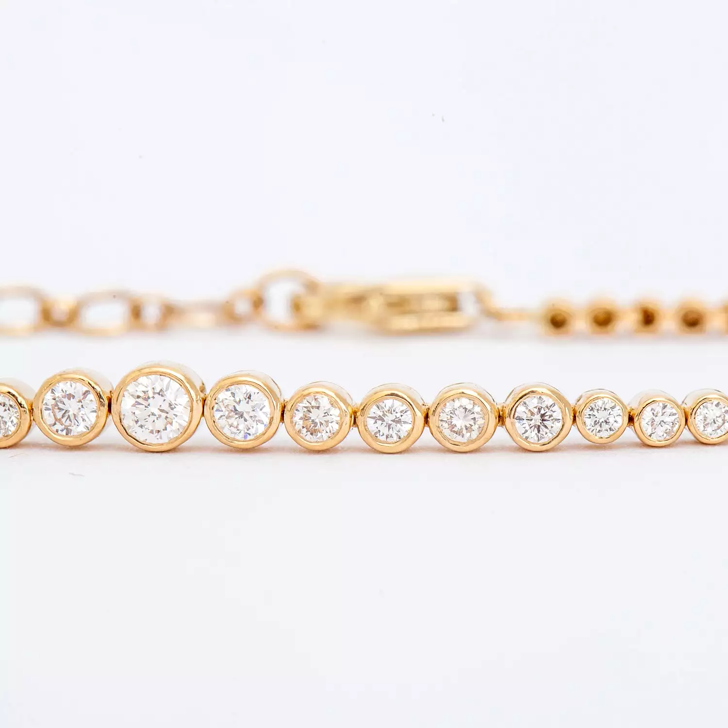 Graduated Round Diamond Half Tennis Bracelet